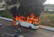 Airport Bus Goes Up in Flames in Highway