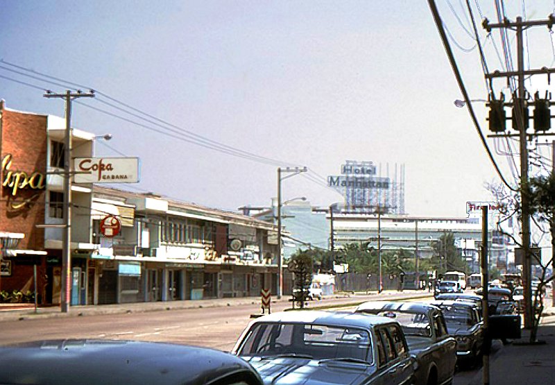 Photo: Sukhumvit Road in the late ‘50s with the visible Copacabana (left), former Check Inn 99. Photo: Chris Catto-Smith / Courtesy