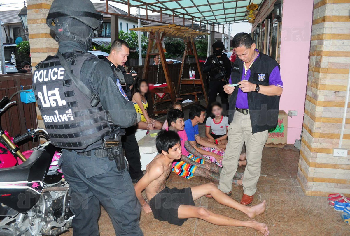 Police commandos arresting drug suspects Nov. 10 in Bangkok