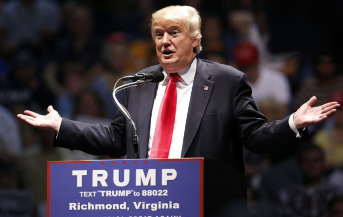 Donald Trump gestures last June during a rally in Richmond, Virginia. Photo: Steve Helber / Associated Press