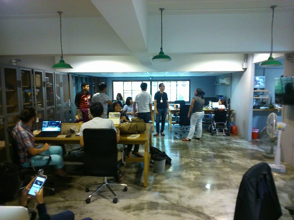 Plainclothes police officers search the offices of Prachatai news Tuesday in Bangkok. Photo: Prachatai / Facebook