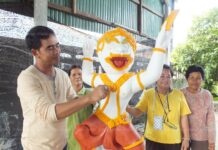Elections Chief Dismisses Fears Voting Will Be Rigged A Korat artist poses for photo on July 11, 2016, with candlewax crafted into the figure of Hanuman, the monkey god adopted by the Election Commission as its mascot for the August 2017 charter referendum.