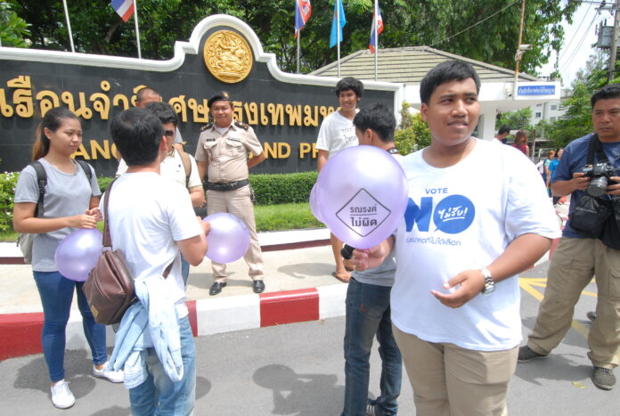 Friends of seven “Vote No” activists pose for photo on Thursday before their prison visit in front of Bangkok Remand Prison.