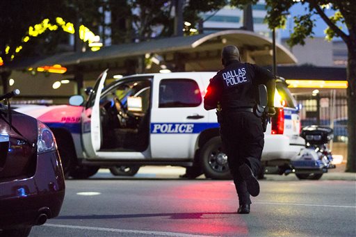 Dallas Police respond after shots were fired at a Black Lives Matter rally in downtown Dallas on Thursday, July 7, 2016. Photo: Smiley N. Pool / The Dallas Morning News / Associated Press