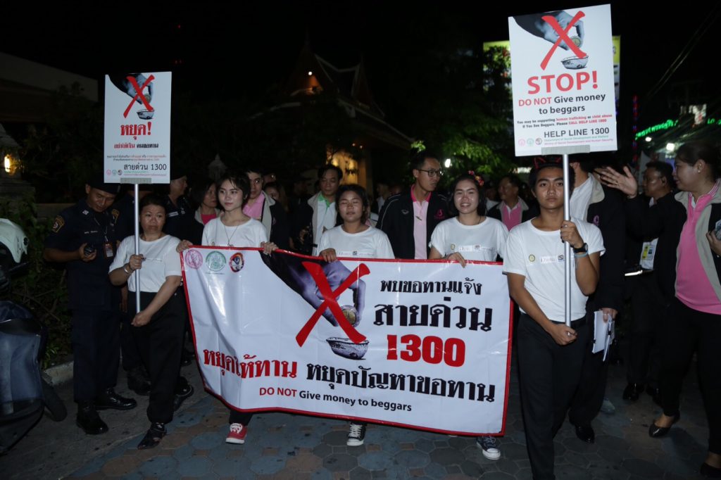 Officials campaign about 1300 hotline on June 15 in Pattaya's Walking Street