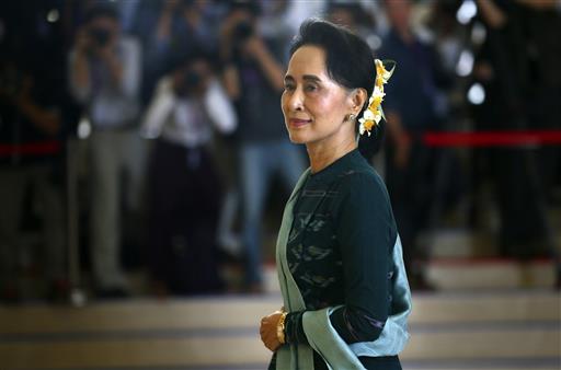 In this March 15, 2016 file photo, National League for Democracy party leader Aung San Suu Kyi arrives in Myanmar's parliament in Naypyitaw, Myanmar. Photo: Gemunu Amarasinghe / Associated Press