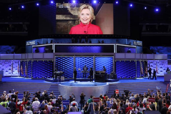 Democratic Presidential candidate Hillary Clinton appears on a large monitor to thank delegates during the second day of the Democratic National Convention in Philadelphia , Tuesday, July 26, 2016. Photo: J. Scott Applewhite