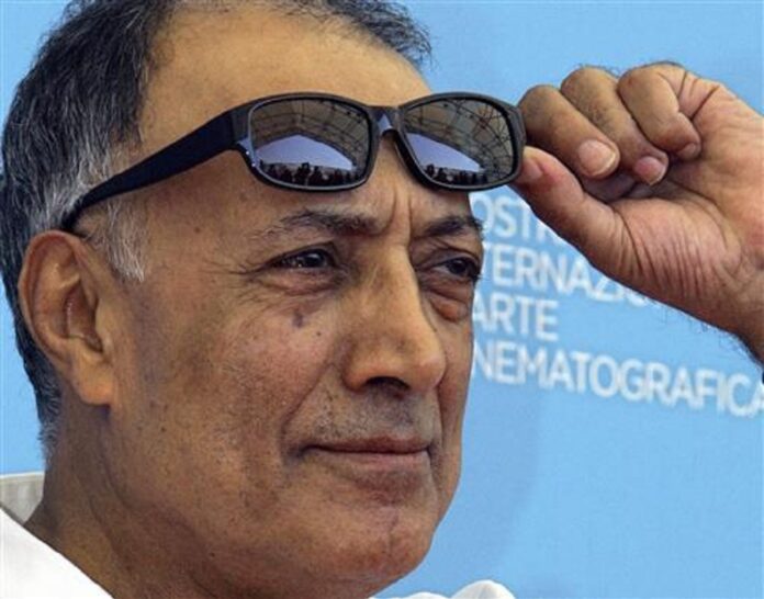 In an Aug. 28, 2008 file photo, acclaimed Iranian film director Abbas Kiarostami poses during the photo call of his movie 'Shirin' (My sweet Shirin) at the 65th edition of the Venice Film Festival in Venice, Italy. Photo: Domenico Stinelli