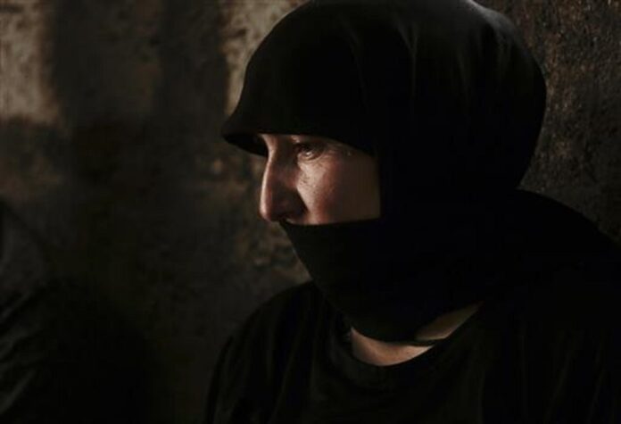 Nuri Murat, a Yazidi woman, speaks to The Associated Press at Kankhe Camp for the internally displaced in Dahuk, northern Iraq, in this May 18, 2016, photo. Photo: Photo: Maya Alleruzzo