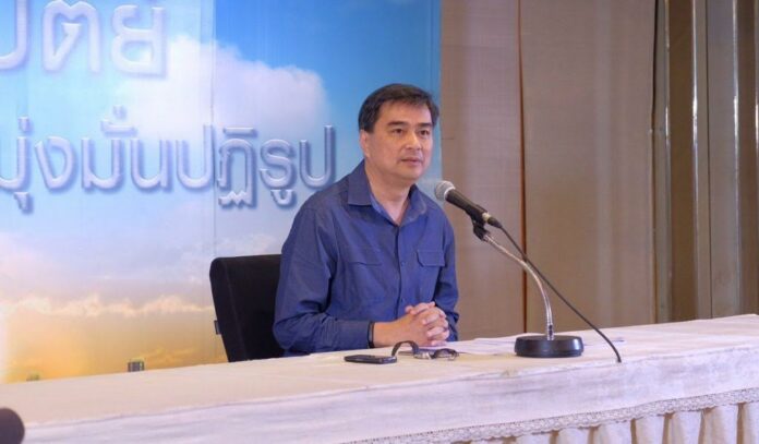 Former Prime Minister Abhisit Vejjajiva speaks Wednesday at Democrat Party headquarters in Bangkok. Photo: Matichon