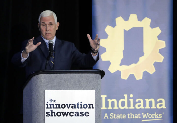Indiana Gov. Mike Pence speaks last July in the U.S. state of Indiana. Photo: Darron Cummings / Associated Press