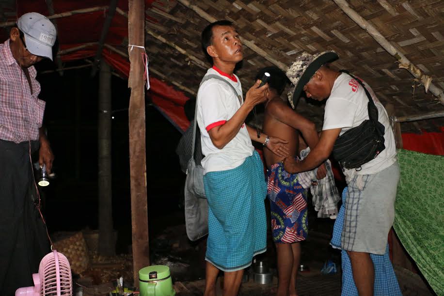 Police raid the house of Maung Maung Oo in Western Khone Thar Village near Kalay, Sagaing Region, on June 26. He was arrested earlier for drug possession, but no drugs were found in his home. Photo: Swe Win / Myanmar Now