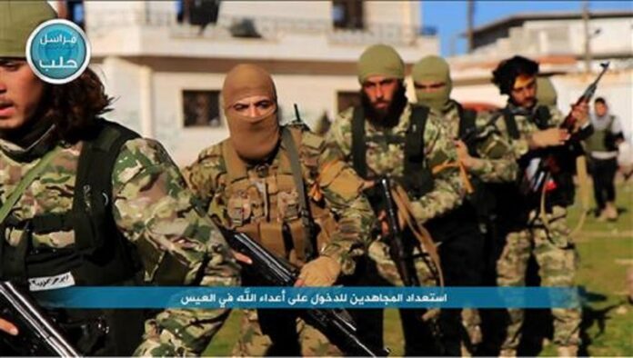This file photo posted on the Twitter page of Syria's al-Qaida-linked Nusra Front on April 1, 2016, shows fighters from al-Qaida's branch in Syria, the Nusra Front, marching toward the northern village of al-Ais in Aleppo province, Syria.Photo: Al-Nusra Front