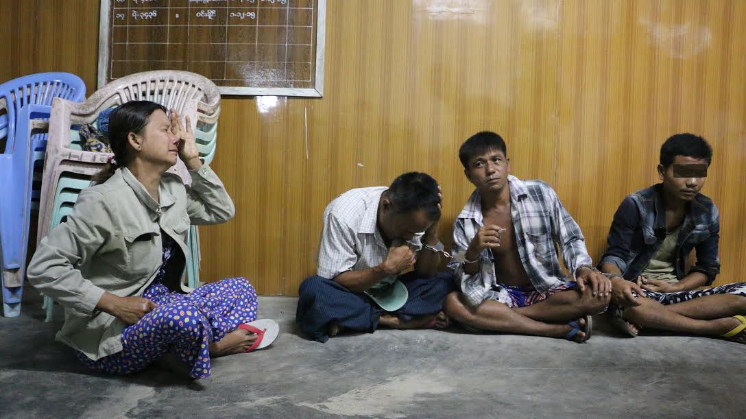  Maung Maung Oo and his cousin Aung Kyaw Kaung (right), a university student, were arrested for drug possession on June 26. Aung Kyaw's mother broke into tears when she saw her son at Kalay Police Station. Photo: Swe Win / Myanmar Now