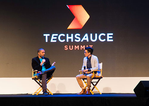 Yossi Hasson, managing director of Techstars Africa, is interviewed by a moderator at Techsauce Summit at the Bangkok Convention Centre.