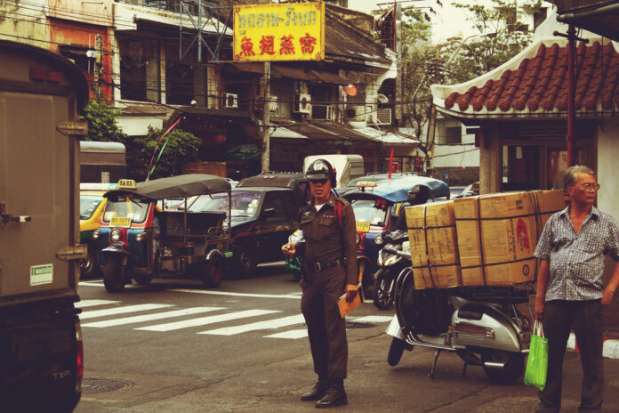 A traffic police officer in Bangkok's Yaowarat area in a 2011 photo. Photo: Mads Bodker