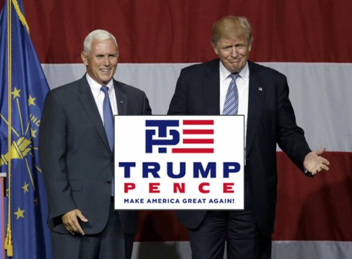 Indiana Gov. Mike Pence joins Republican presidential candidate Donald Trump in 2016 at a rally in Westfield, Indiana. Photo: Michael Conroy / Associated Press