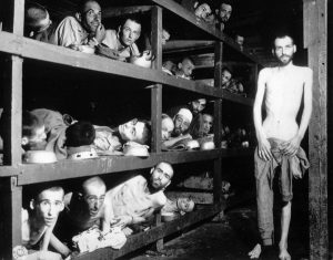 FILE - This April 16, 1945 file photo provided by the U.S. Army, Elie Wiesel, the sevent from left in the middle row, is among inmates at the German KZ Buchenwald concentration camp near Weimar a few days after it was liberated by U.S. soldiers. Photo: US Army / Associated Press