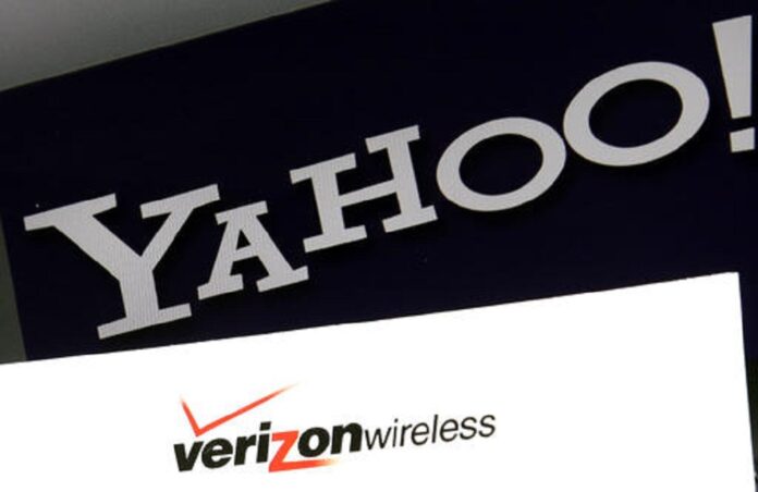 Logos are seen on a laptop, Monday, July 25, 2016, in North Andover, Mass. Verizon is buying Yahoo for $4.83 billion, marking the end of an era for a company that once defined the internet. Photo: Elise Amendola