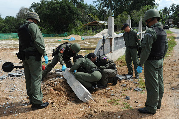 The aftermath of a roadside bomb attack in Narathiwat province in December 2014.
