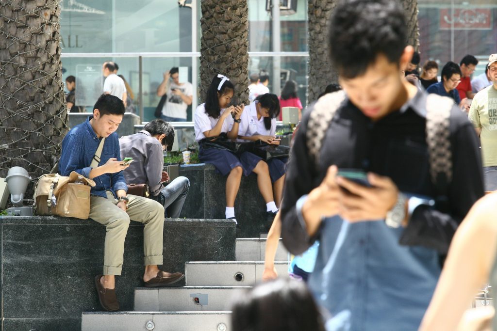 Since the game’s release Bangkok’s Siam Paragon shopping mall has been swarming with players such as these on Monday.