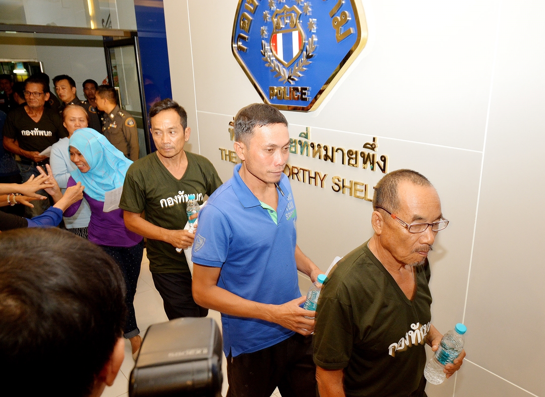 Police on Friday escort the 15 suspects to the Crime Suppression Division in Bangkok for interrogation and news conference.