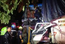 Six Killed When Bus Slides Into Path of Truck