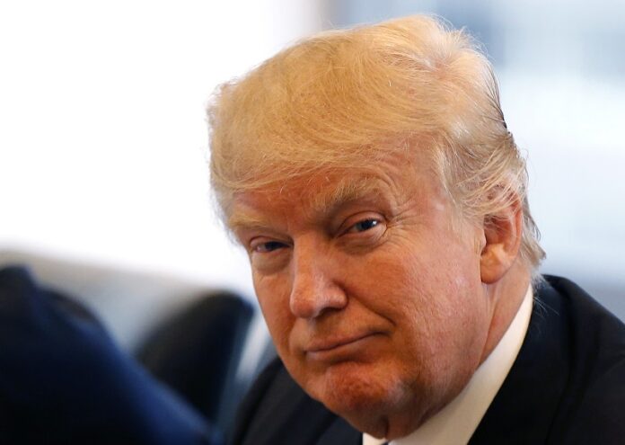 Republican presidential candidate Donald Trump smiles last month as he participates in an August roundtable discussion on national security in his offices in Trump Tower in New York. Photo: Gerald Herbert / Associated Press