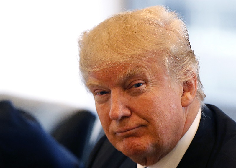 Republican presidential candidate Donald Trump smiles last month as he participates in an August roundtable discussion on national security in his offices in Trump Tower in New York. Photo: Gerald Herbert / Associated Press