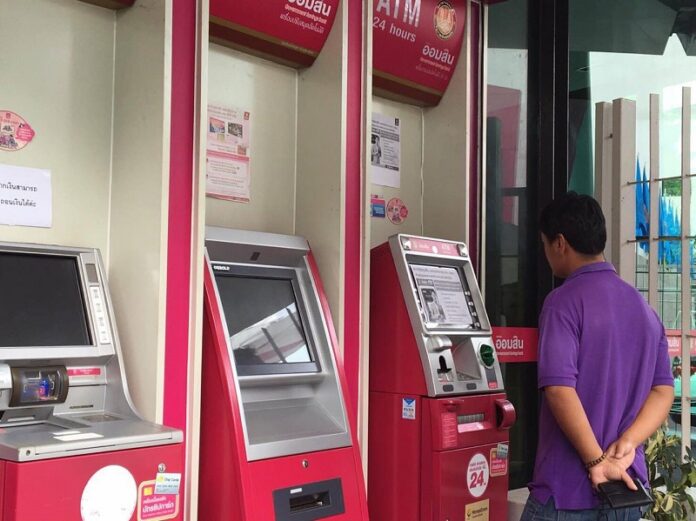 ATMs in front of the Government Savings Bank headquarters in Bangkok are out of service as seen on Tuesday.