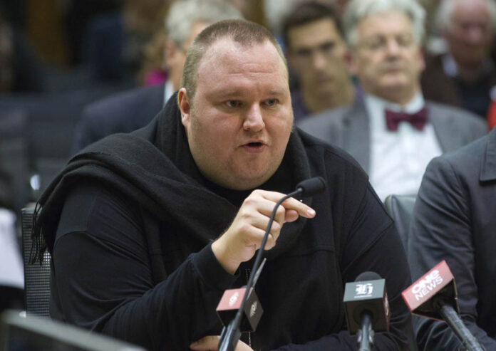 Internet entrepreneur Kim Dotcom speaks during an Intelligence and Security select committee hearing at Parliament in Wellington, New Zealand in a July 3, 2013, file photo. Photo: Mark Mitchell / New Zealand Herald / Associated Press