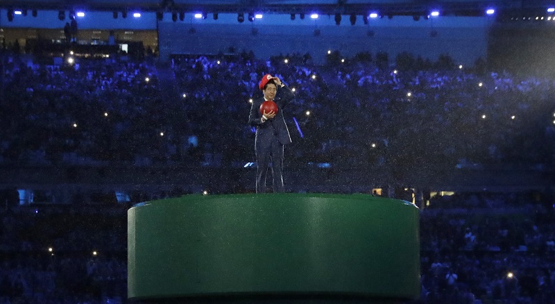 Japan's Prime Minister Shinzo Abe appears during the closing ceremony in the Maracana stadium on Sunday at the 2016 Summer Olympics in Rio de Janeiro. Photo: Matt Dunham / Associated Press