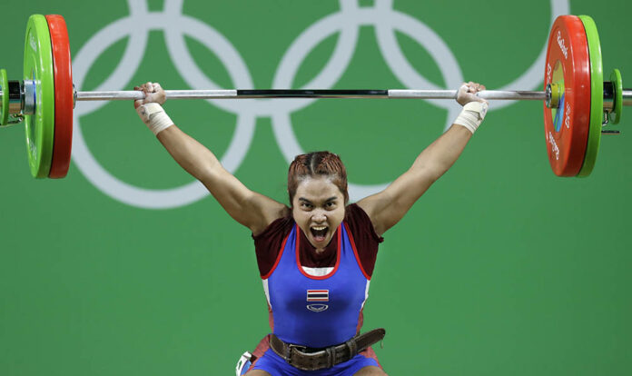 Sopita Tanasan, of Thailand, competes in the women's 48kg weightlifting competition at the 2016 Summer Olympics in Rio de Janeiro on Saturday. Photo: Mike Groll / Associated Press