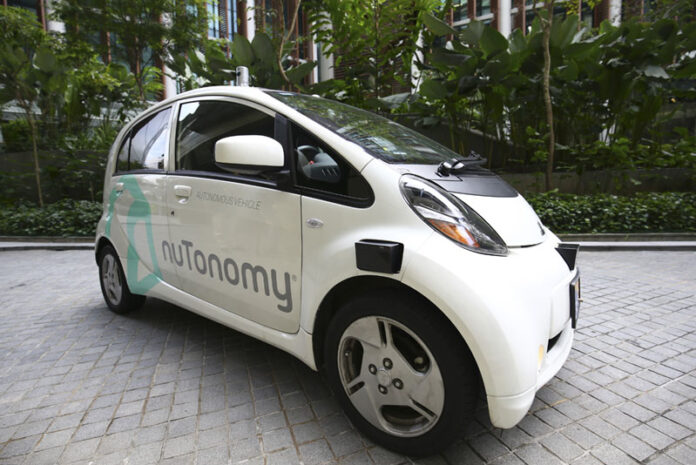 An autonomous vehicle is parked for its test drive in Singapore on Wednesday. Photo: Yong Teck Lim / Associated Press