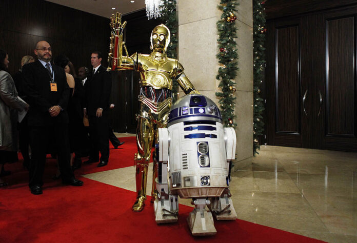 Star Wars characters C-3PO, left, and R2D2 arrive at the American Cinematheque Award gala honoring Samuel L. Jackson in Beverly Hills, Calif., in 2008. Photo: Matt Sayles / Associated Press