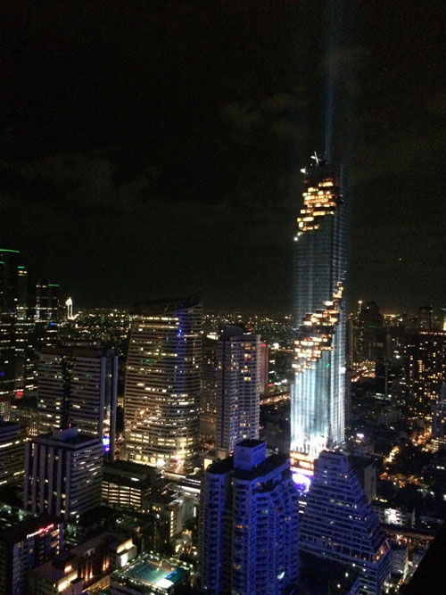 Bangkok's new tallest building, MahaNakhon, is lit up in a Monday night light show. Photo: Chayanit Itthipongmaetee