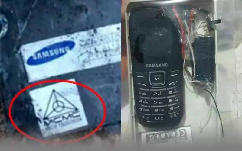 A police image of phones used in the attack. The MCMC sticker stands for Malaysian Communications And Multimedia Commission.