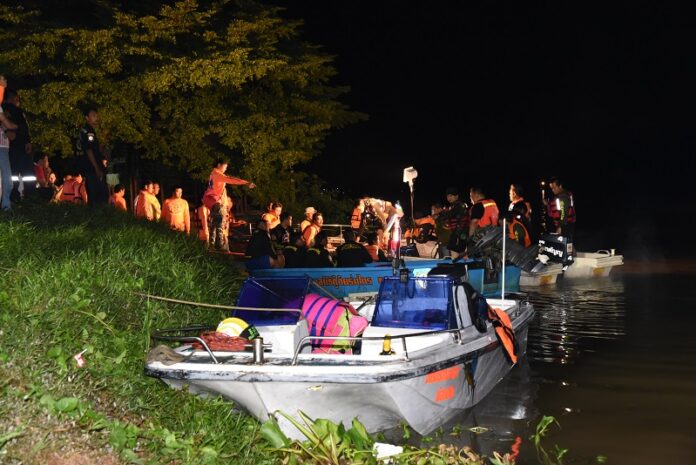 Rescue workers at the scene early Tuesday morning in Ayutthaya province.