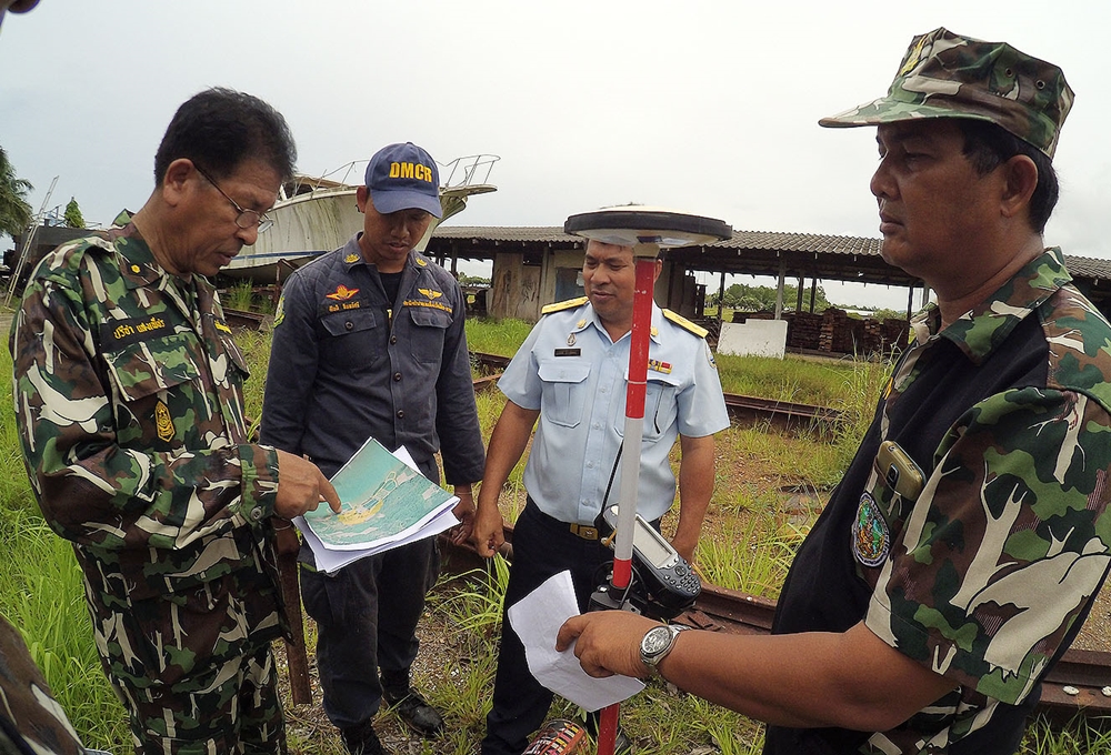 Officials from the Department of Marine and Coastal Resources on Wednesday inspect the property owned by CP executive Jaran Chiaravanont in Trat province.