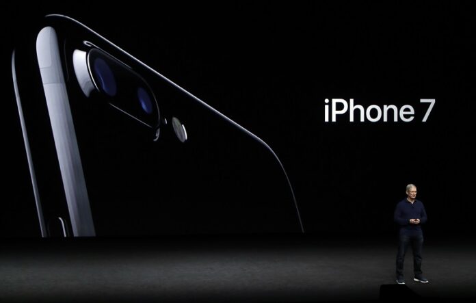 Apple CEO Tim Cook announces the new iPhone 7 on Wednesday during an event to announce new products in San Francisco, United States. Photo: Marcio Jose Sanchez / Associated Press