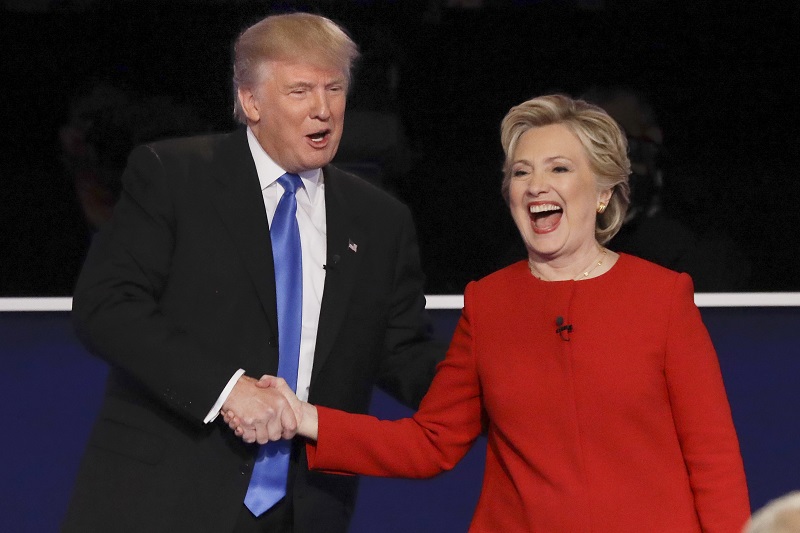 Republican presidential nominee Donald Trump and Democratic presidential nominee Hillary Clinton shake hands after the presidential debate on Monday at Hofstra University in Hempstead, N.Y. Photo: David Goldman / Associated Press