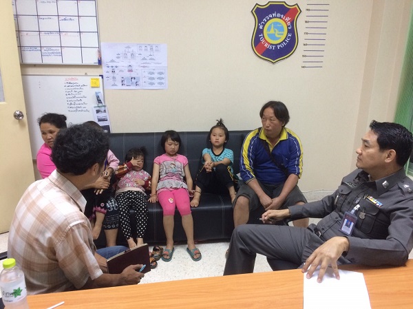 The Hmong family meets with Phuping police Tuesday in Chiang Mai.