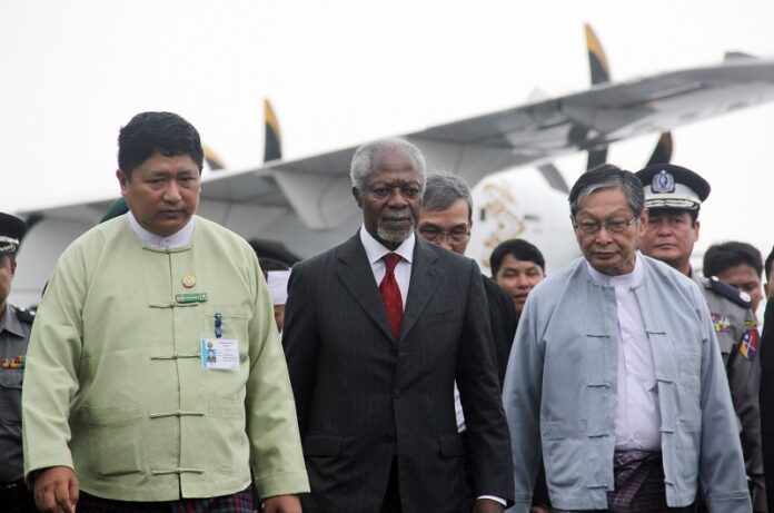 Former United Nations Secretary-General Kofi Annan, center, who chairs the recently created Rakhine State Advisory Commission, escorted by local authorities as he arrived September at the airport in Sittwe, Myanmar. Photo: Esther Htusan / Associated Press