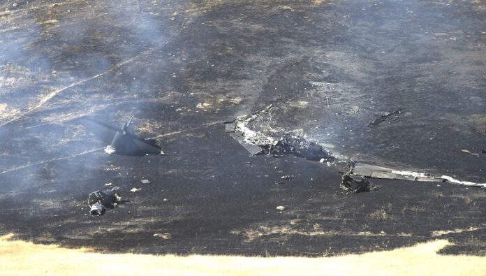Smoke rises from the wreckage of a U.S. Air Force U-2 spy plane that crashed Tuesday in the Sutter Butte mountains, near Yuba City, California. Photo: Rich Pedroncelli / Associated Press