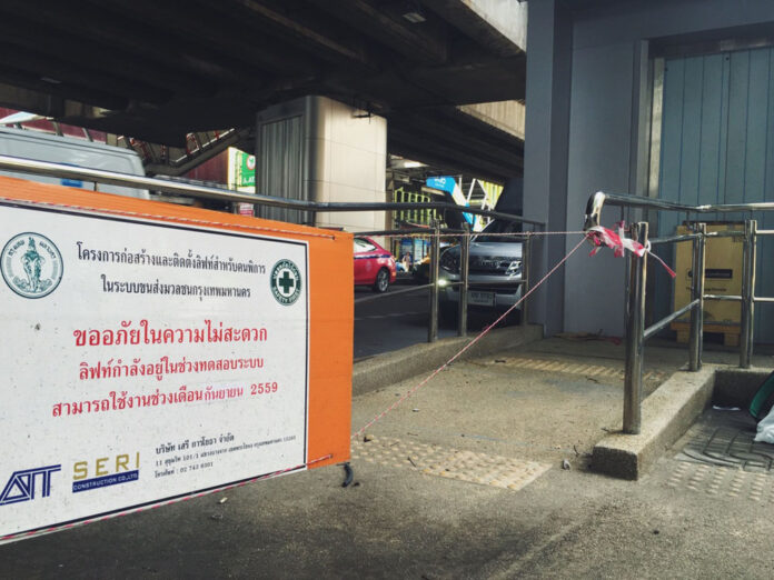 Unfinished structure for a street level elevator at BTS Ari was roped off with a sign saying it would be ready in September.