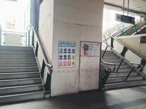 Unfinished structure for a street level elevator at BTS Ari was roped off with a sign saying it would be ready in September.