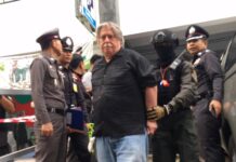 Foreigners Arrested After Raid on Forgery Ring Leads to Body in Fridge