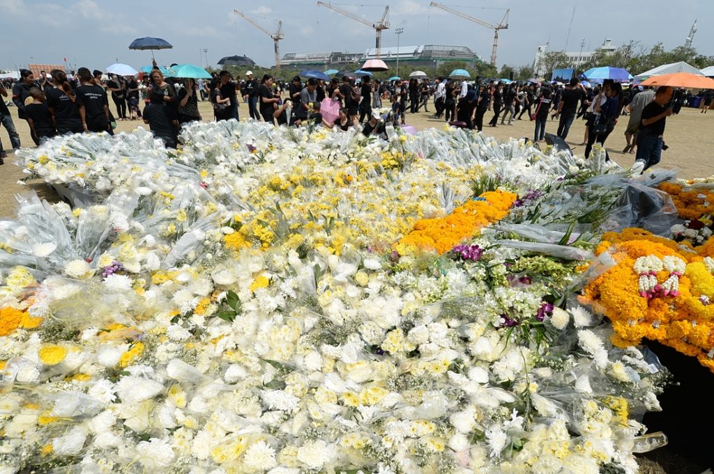 Flowers left by mourners at Sanam Luang on Tuesday