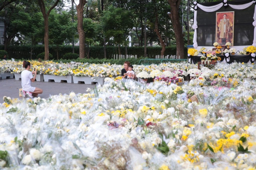 Piles of flowers at Saranrom Park on Tuesday