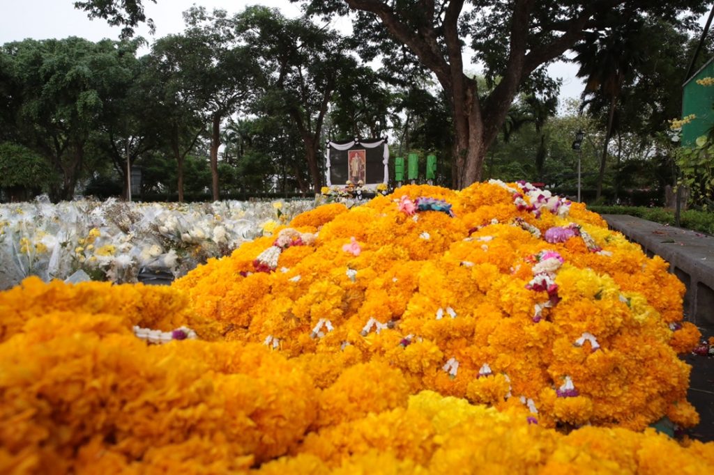 Piles of flowers at Saranrom Park on Wednesday